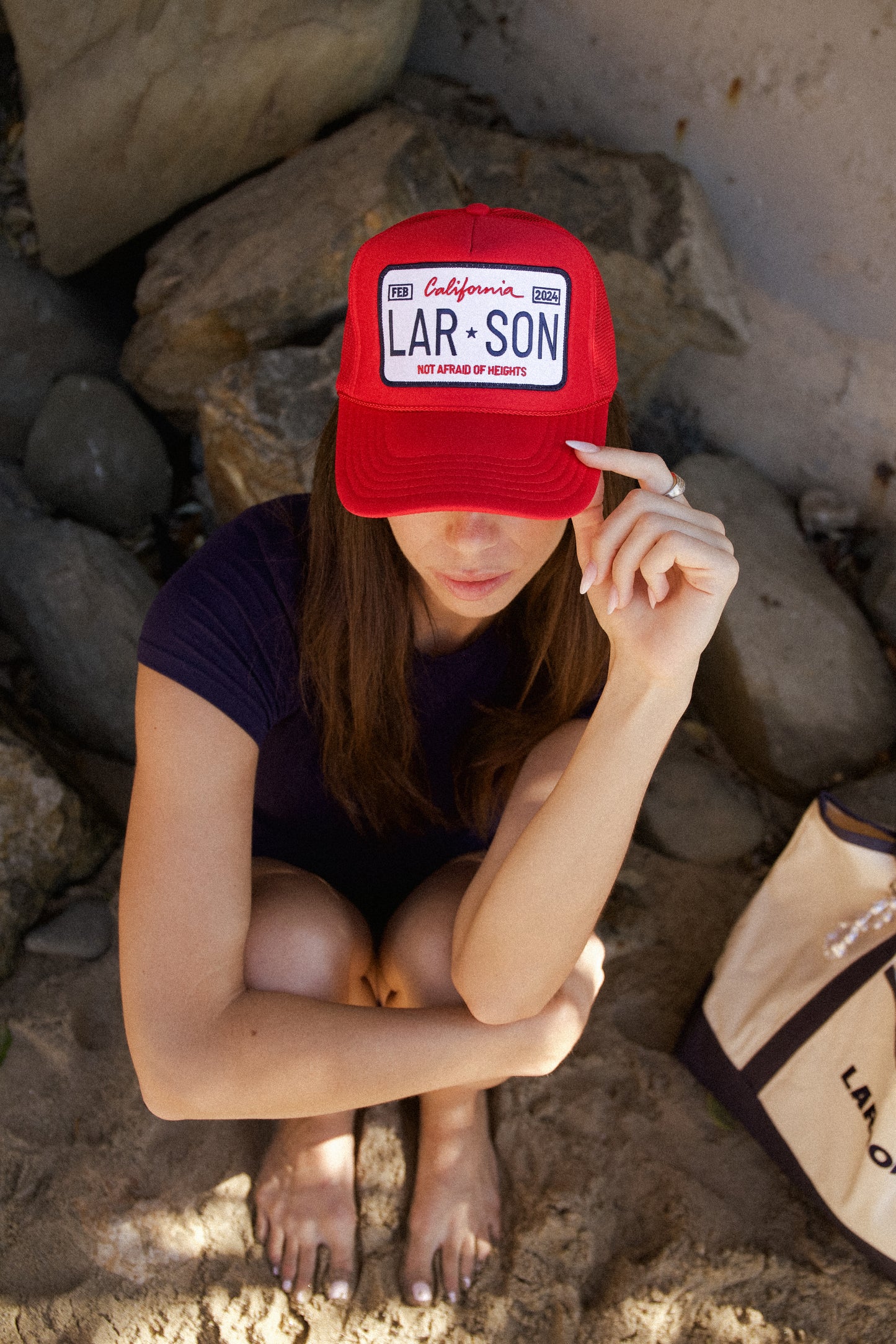 LICENSE PLATE TRUCKER HAT IN RED