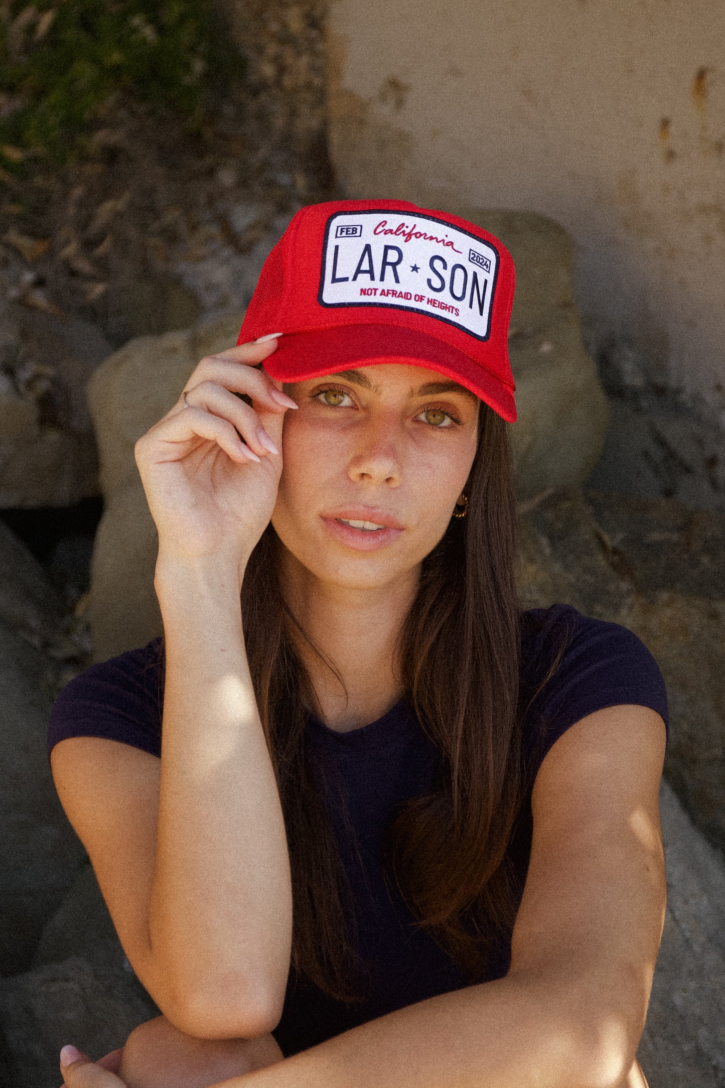 LICENSE PLATE TRUCKER HAT IN RED