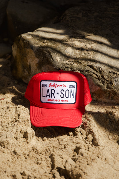 LICENSE PLATE TRUCKER HAT IN RED