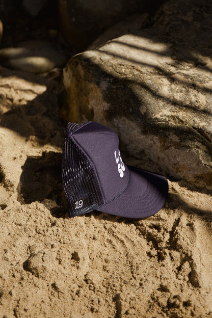 LARSON STACKED TRUCKER HAT IN NAVY